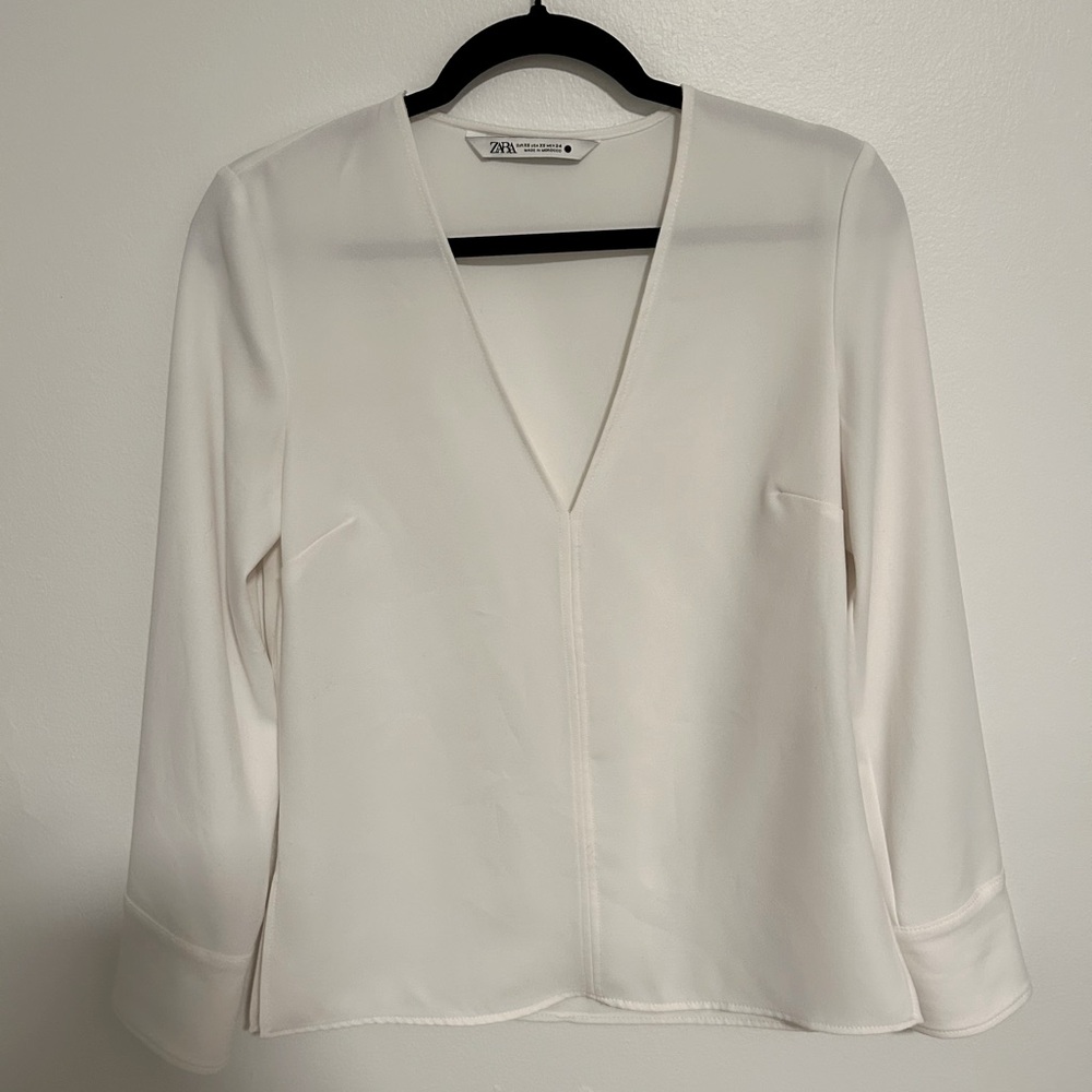 Sleek white Zara V-neck blouse